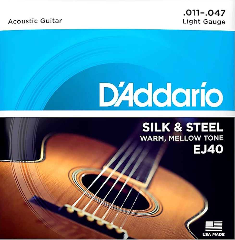 D'Addario acoustic guitar string set packaging with guitar and brand name.