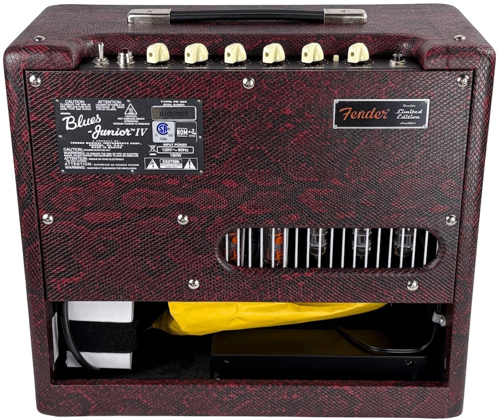 Fender Blues Junior IV guitar amplifier with a red and black patterned front panel.