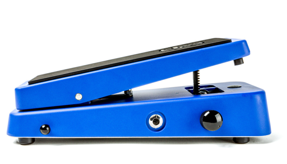 Blue guitar pedal with black components on a white background