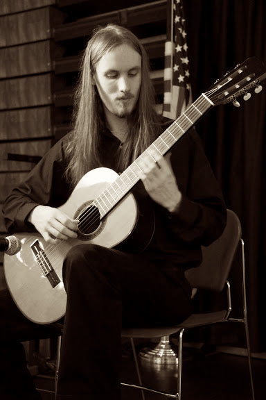 Twin Town Guitars in Minneapolis is pleased to offer guitar, bass, piano and ukulele lessons with Andrew Brassard.