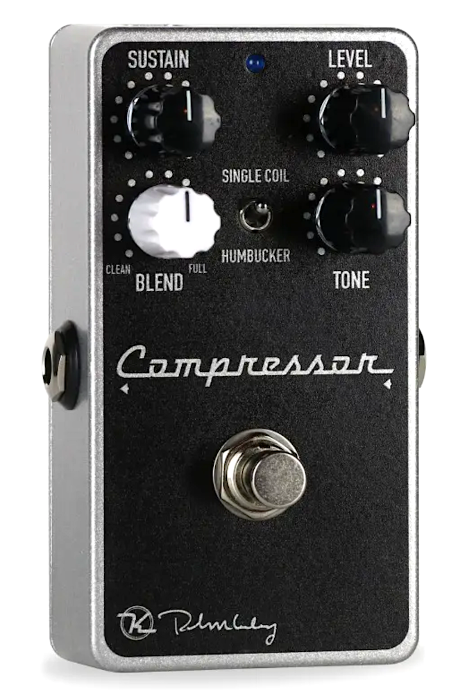 Guitar effects pedal with 'Compressor' branding on a white background