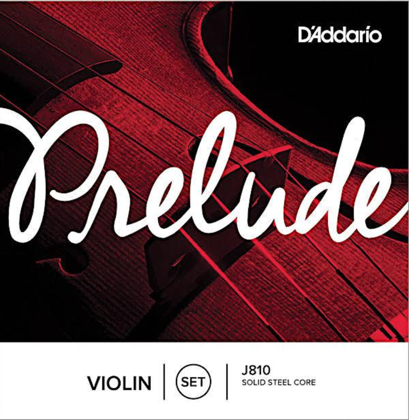 Packaging for D'Addario Prelude violin strings with a red and black design, indicating a set for 4/4 size violin with a solid steel core.