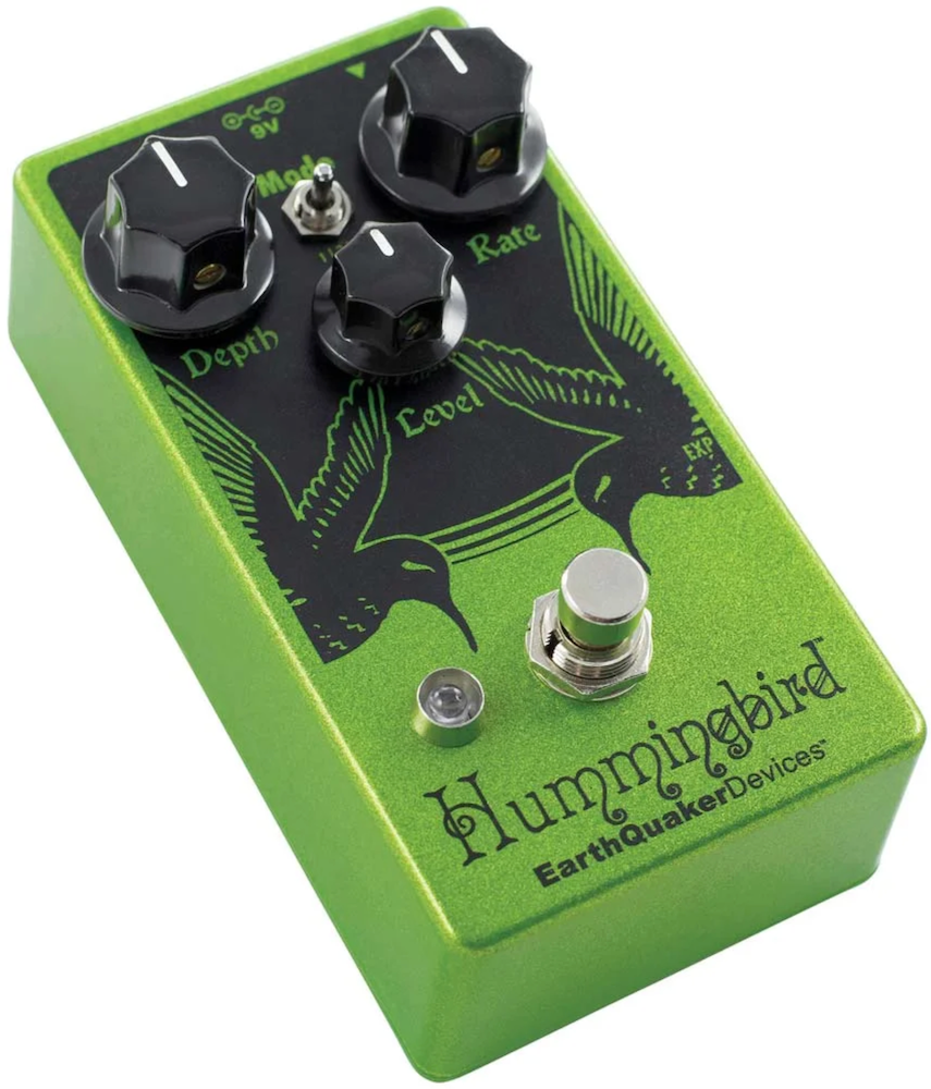 Green and black guitar effects pedal with 'Hummingbird' branding on a white background at Twin Town Guitars in Minneapolis, Minnesota
