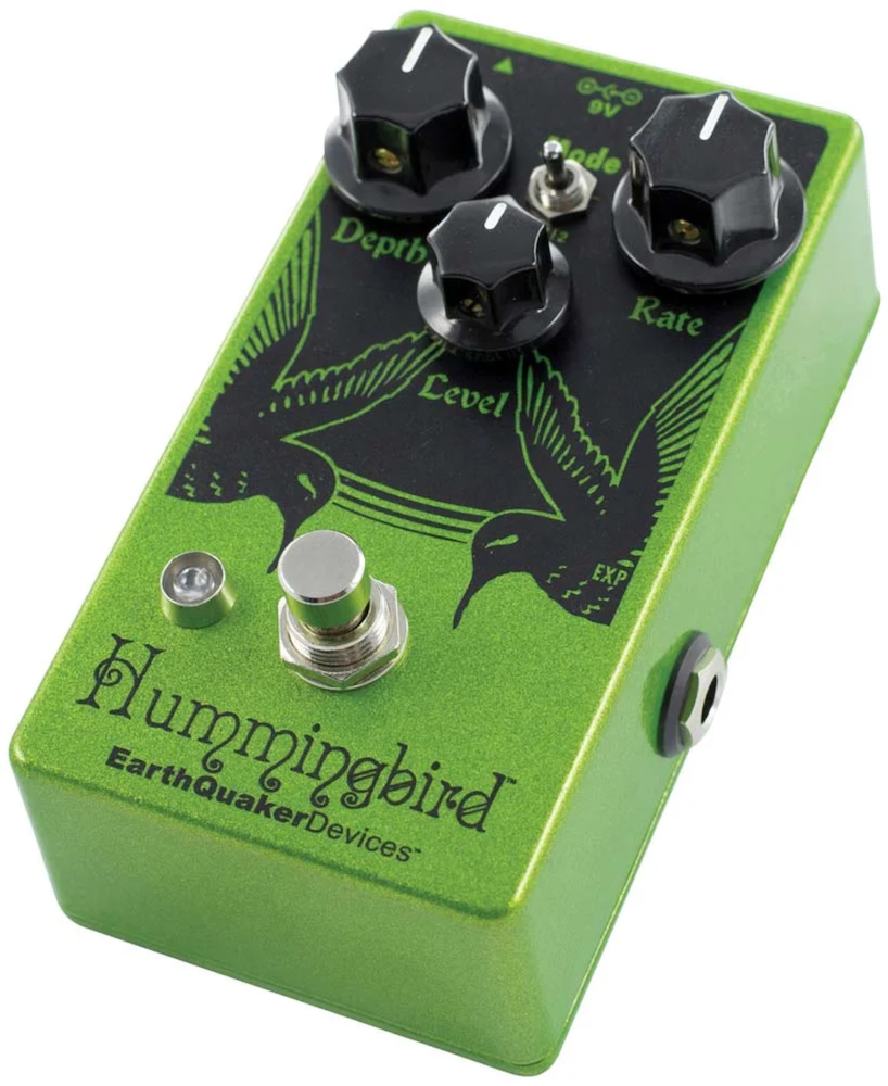 Green and black guitar effects pedal with 'Hummingbird' branding on a white background at Twin Town Guitars in Minneapolis, Minnesota