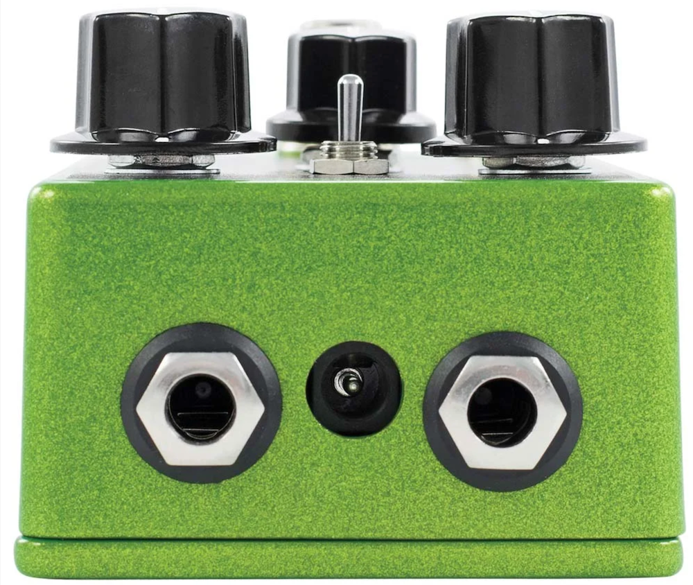 Green and black guitar effects pedal with 'Hummingbird' branding on a white background at Twin Town Guitars in Minneapolis, Minnesota