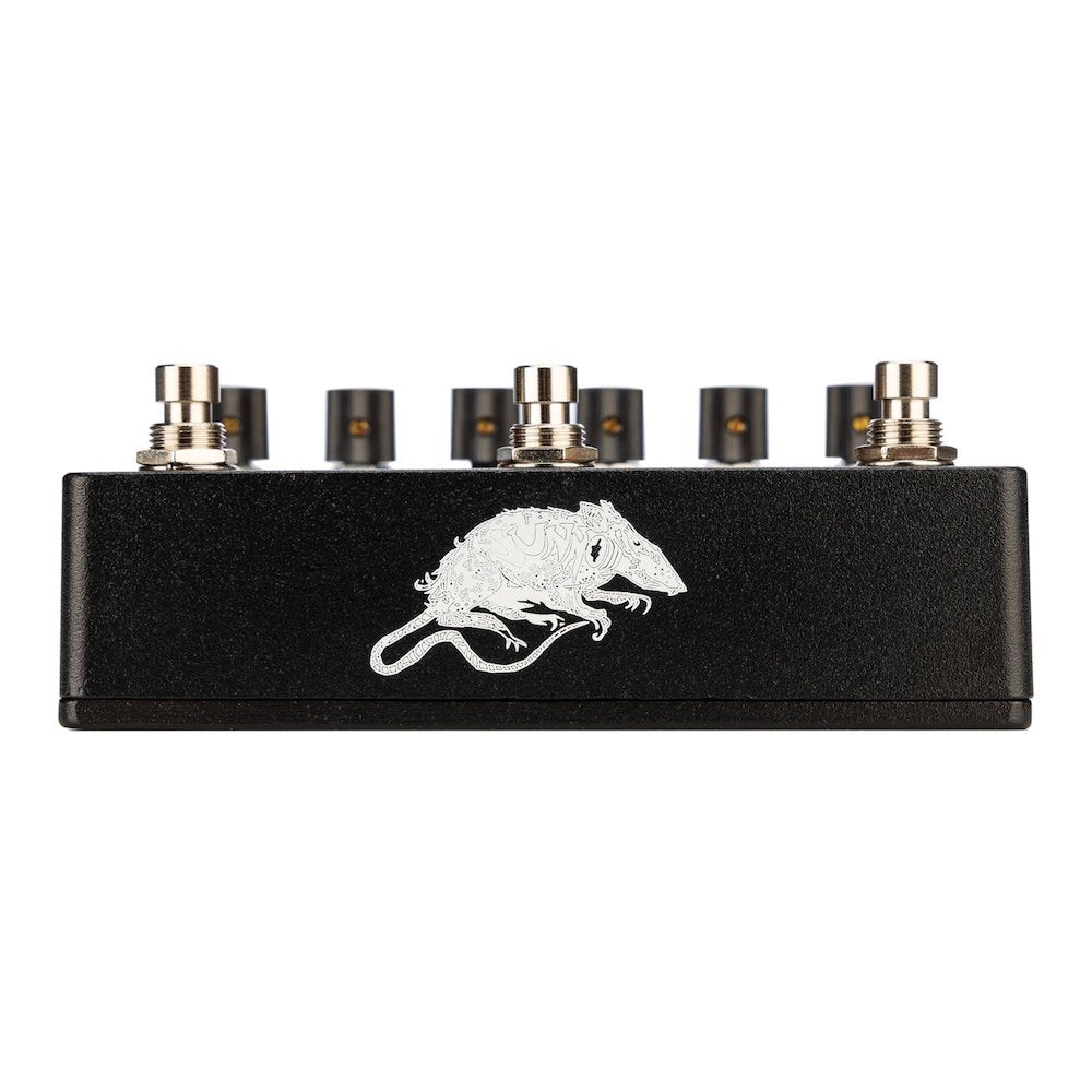 An effects pedal with knobs and switches, featuring a black body with red and yellow decorative elements and the 'sunn Life Pedal' text displayed.