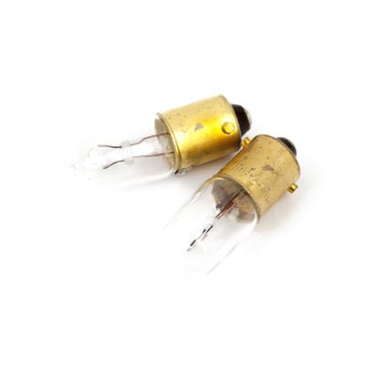 Two vintage-style light bulbs with brass casings on a white background