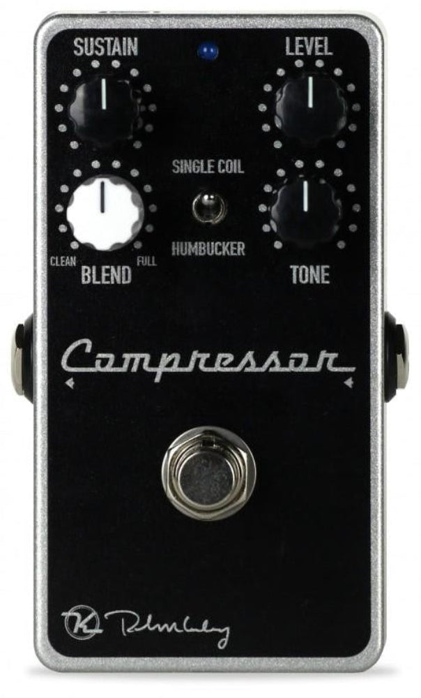 Compressor guitar effects pedal with knobs and branding on a white background