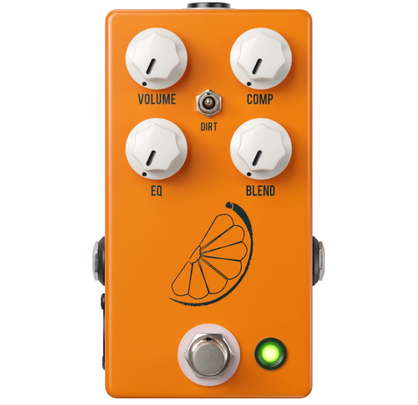 Orange guitar effects pedal with white knobs and a green indicator light on a white background