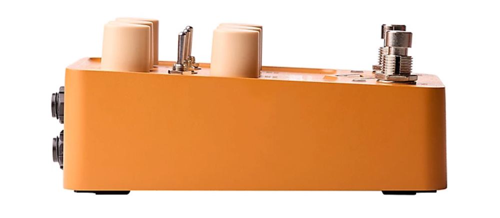 Orange guitar effects pedal with multiple knobs and jacks on a white background