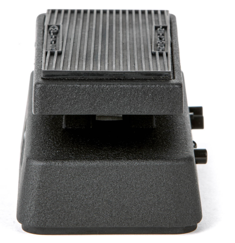 Black foot pedal on a white background