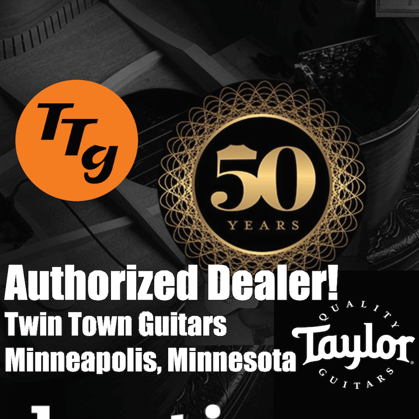 Advertisement for Twin Town Guitars with Taylor Guitars branding and 'Authorized Dealer' text.