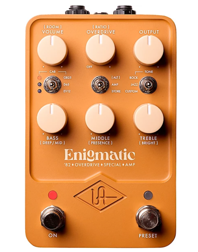 Guitar effects pedal with various knobs and switches on a white background