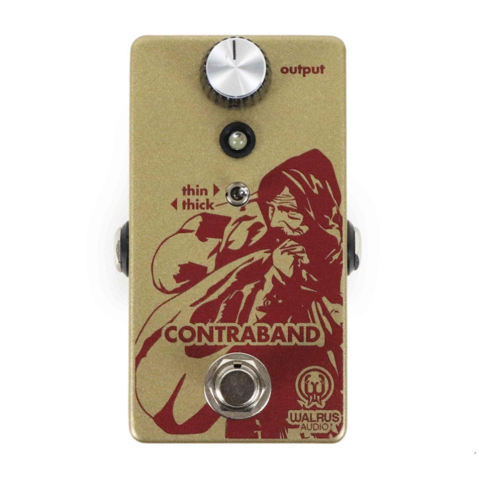 A photo of the Walrus Audio Contraband Fuzz Guitar Effects Pedal, showing a red and gold colored pedal with a single knob and a graphic of a cartoonish character on the label, Walrus Audio Contraband Fuzz Guitar Effects Pedal at Twin Town Guitars in Minneapolis Minnesota
